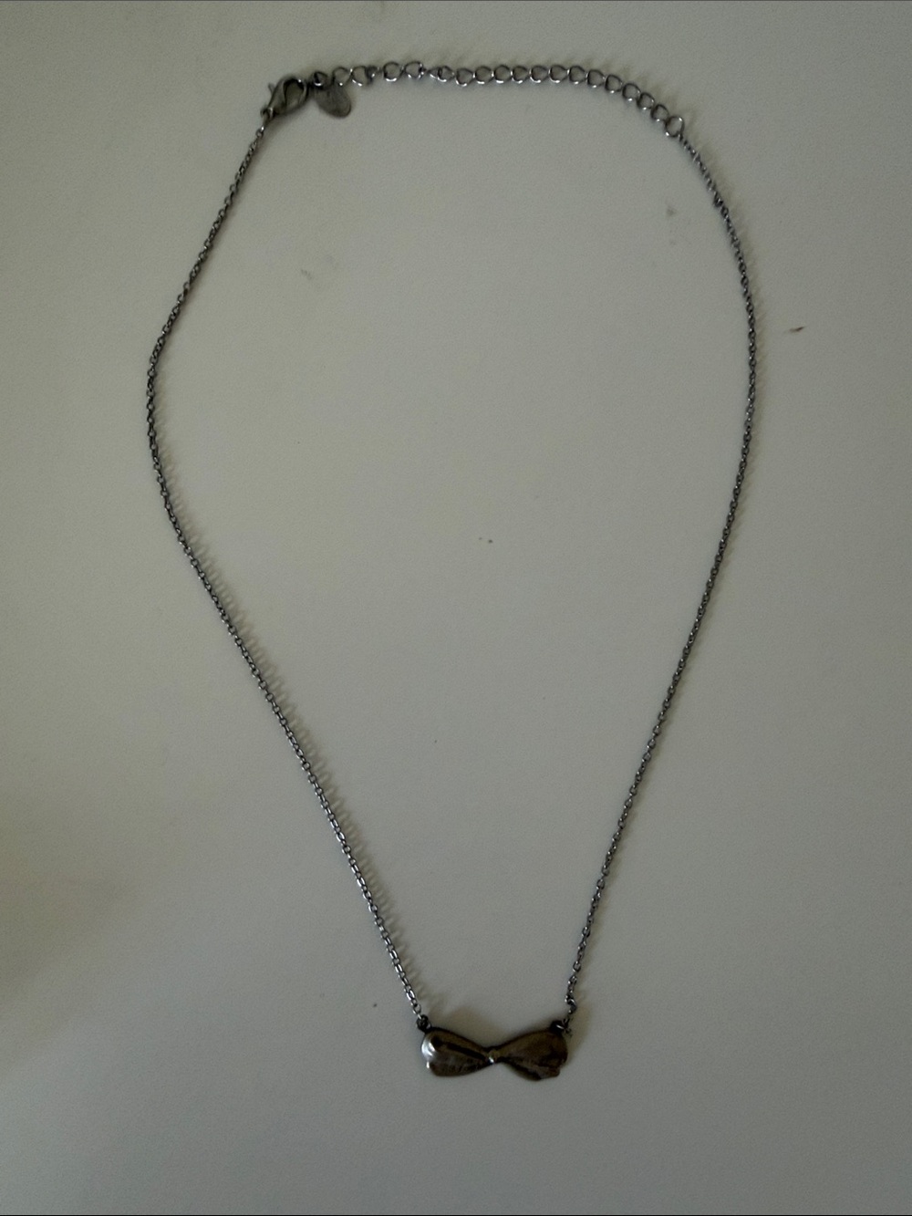 Delicate Silver Bow Pendant Necklace